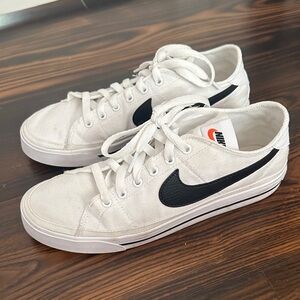 Nike women’s White Sneakers with Black Swoosh